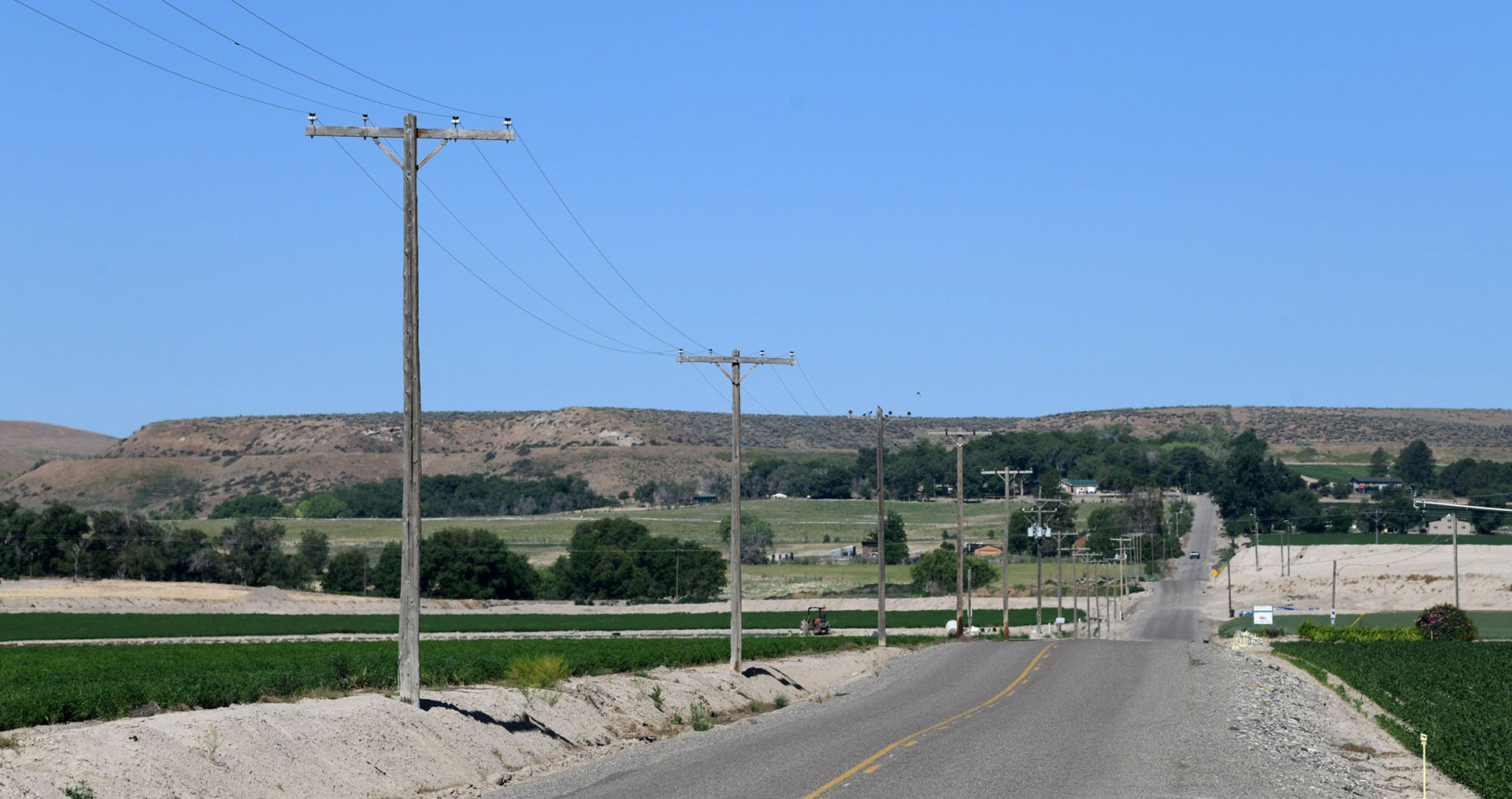 Transmission lines along a road