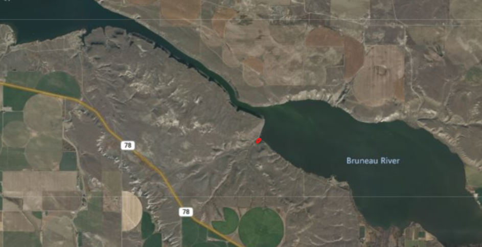 Red dot highlighting a section of the Bruneau River by the dock as closed